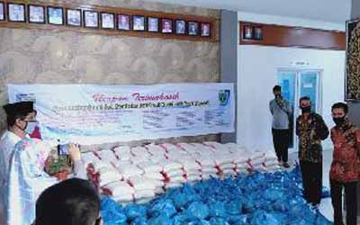 DONASI UNTUK WARGA SEKOLAH DAN MASYARAKAT SEKITAR SMAN 2 PADANG YANG TERDAMPAK PANDEMI COVID 19